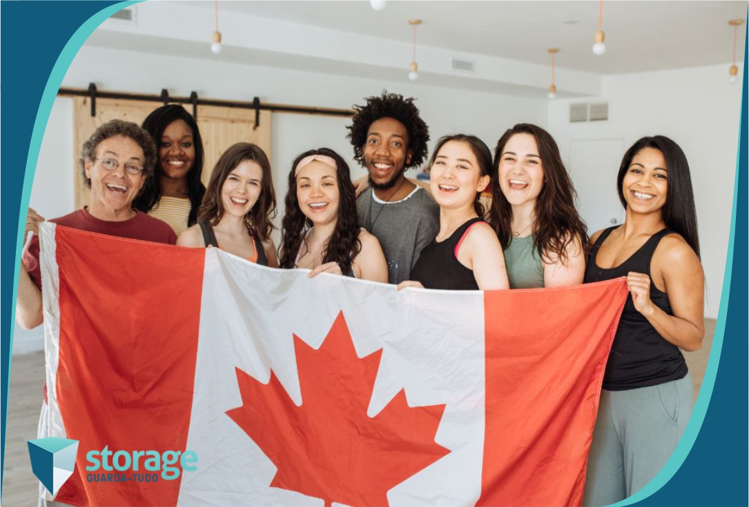 Pessoas reunidas com bandeira do Canadá. Imagem ilustrativa para texto canadá imigração.